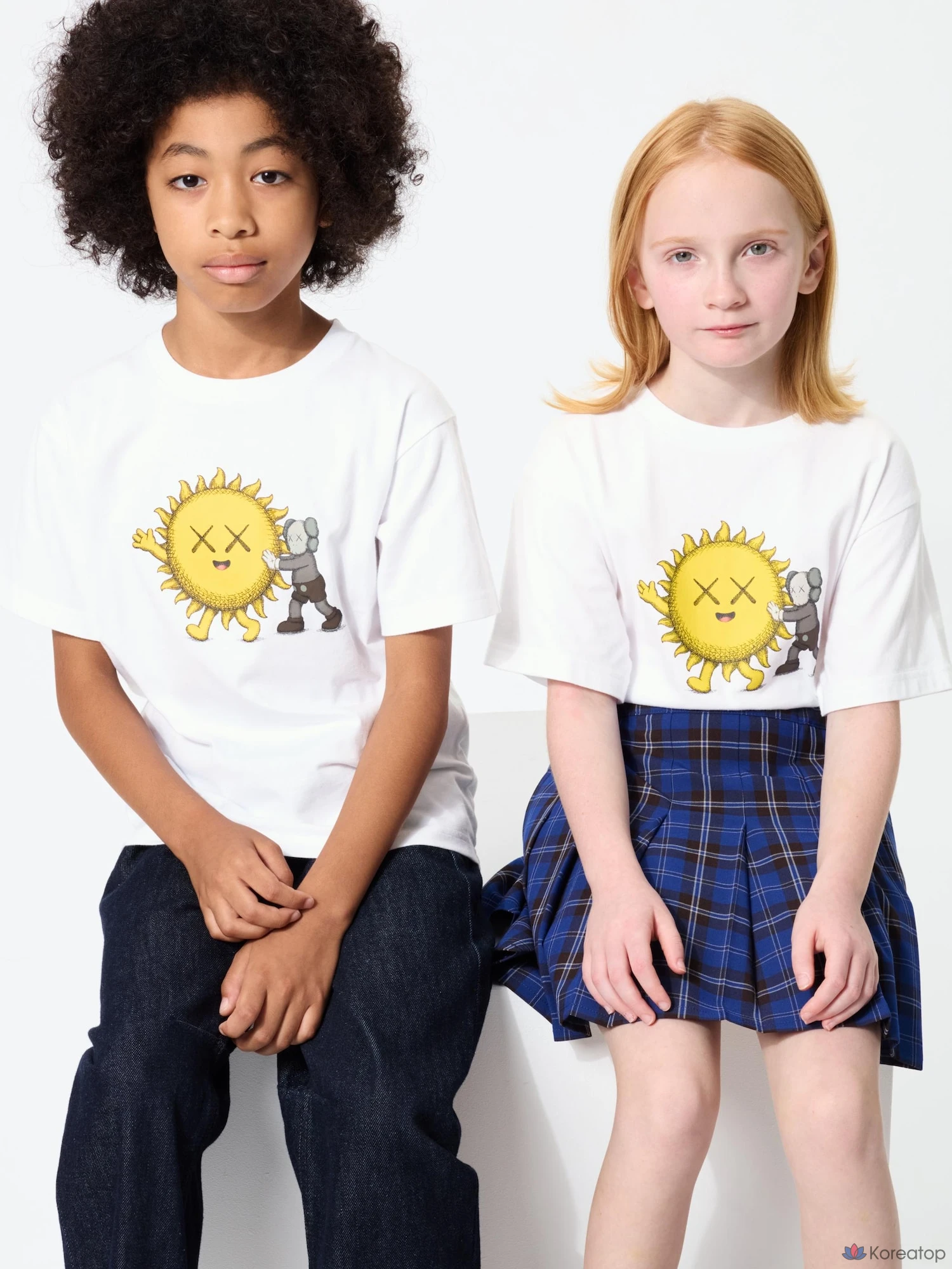 Футболка детская Uniqlo KAWS Universe UT Graphic T-Shirt, черный