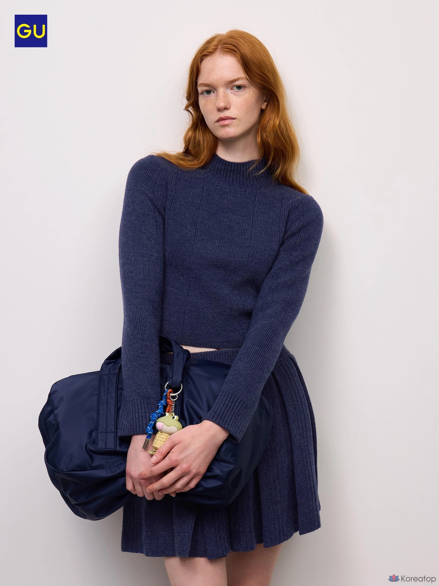 Свитер Uniqlo High Neck.