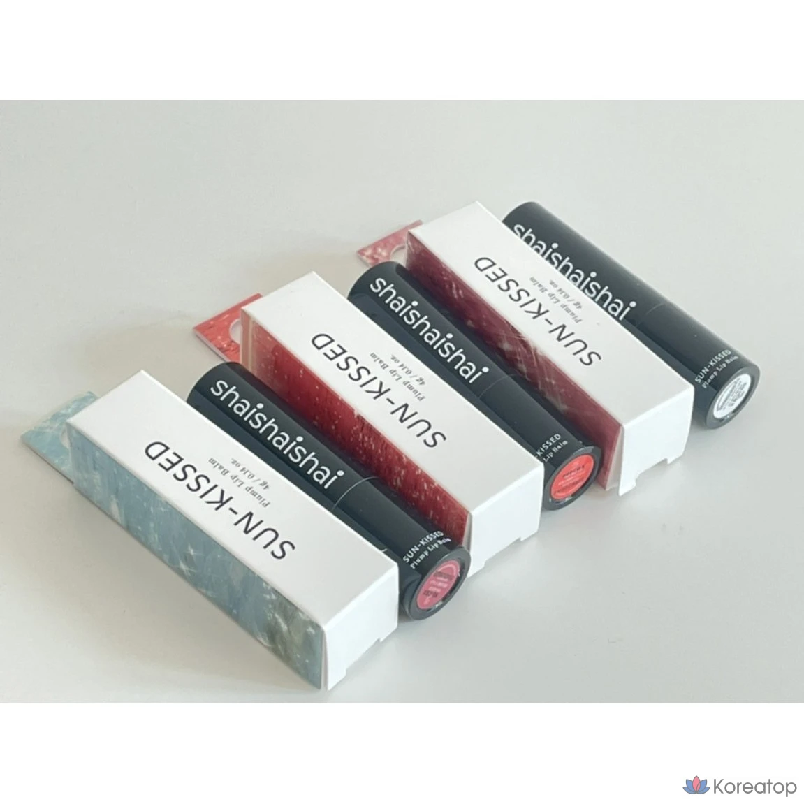 Бальзам для губ Sun-Kissed Plump Lip Balm, оттенок Sunlit Beige, 4 г, 1 шт.