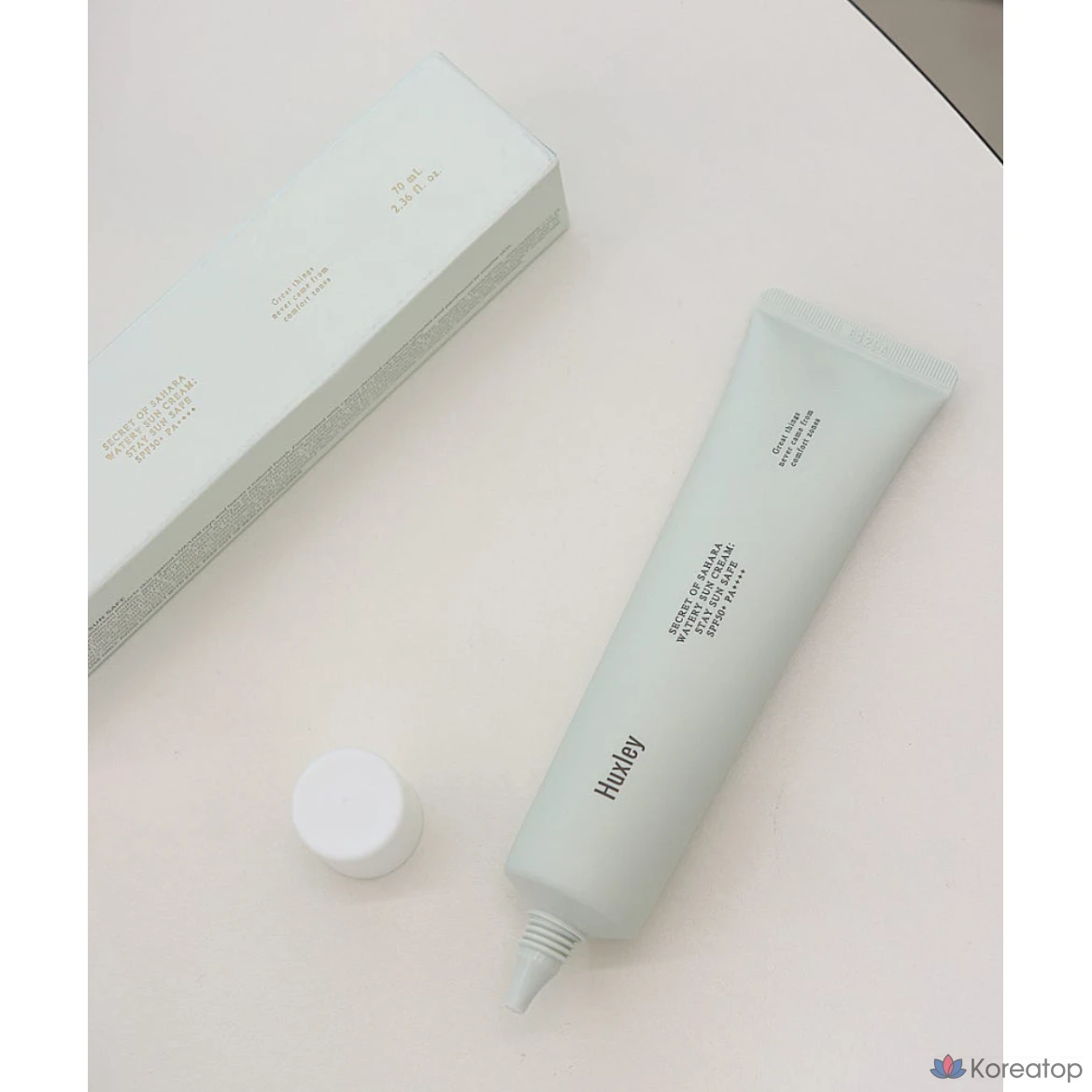 Солнцезащитный крем Huxley Watery Sun Cream Stay Sun Safe, 70 мл. Мягкий органический солнцезащитный крем Huxley, с низким уровнем раздражения, SPF50+ PA++++. Отбеливание, разглаживание морщин, защита от УФ-излучения. Тройная функция, 1 шт., фото 2